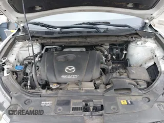 2016 Mazda CX-5 Grand Touring with VIN JM3KE4DY7G0737232, listed as a IAAI auction lot 42158279 with Not Provided miles and . Bid and sale history available at DreamBid. Image 10.