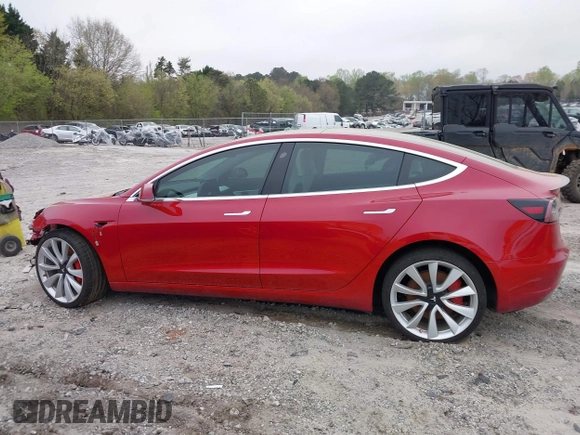2018 Tesla Model 3 Long Range Battery with VIN 5YJ3E1EB7JF055384, listed as a IAAI auction lot 41924325 with 52,039 mi miles and . Bid and sale history available at DreamBid. Image 13.