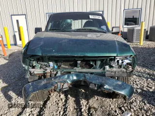 1999 Ford Ranger XL with VIN 1FTZR15V4XPB69379, listed as a Copart auction lot 77893134 with 150,343 mi miles and Non Repairable. Bid and sale history available at carsss.com. Image 5.