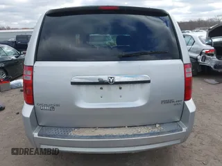 2010 Dodge Grand Caravan SXT with VIN 2D4RN5D13AR180609, listed as a IAAI auction lot 41857215 with Not Provided miles and . Bid and sale history available at DreamBid. Image 16.