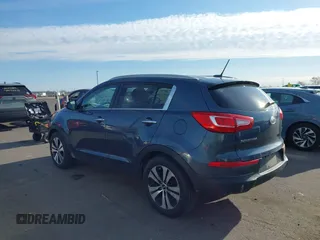 2012 Kia Sportage EX with VIN KNDPCCA22C7325011, listed as a IAAI auction lot 42046727 with 131,475 mi miles and . Bid and sale history available at DreamBid. Image 3.