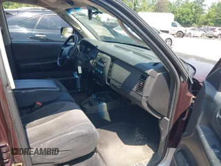 2004 Dodge Dakota SLT with VIN 1D7HG48N24S556431, listed as a IAAI auction lot 42591078 with 213,777 mi miles and . Bid and sale history available at DreamBid. Image 5.