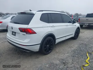 2020 Volkswagen Tiguan SE with VIN 3VV2B7AX1LM151388, listed as a IAAI auction lot 41480146 with 154,567 mi miles. Bid and sale history available at carsss.com. Image 4.
