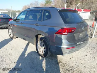 2019 Volkswagen Tiguan S with VIN 3VV0B7AX1KM059932, listed as a IAAI auction lot 41757859 with 76,522 mi miles. Bid and sale history available at carsss.com. Image 3.