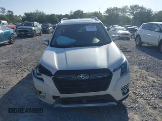 2023 Subaru Forester Touring with VIN JF2SKARC5PH500285, listed as a IAAI auction lot 42509493 with 18,737 mi miles and . Bid and sale history available at DreamBid. Image 12.