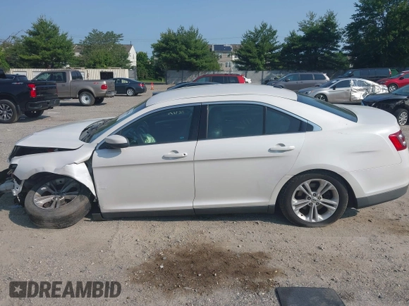 2015 Ford Taurus SEL with VIN 1FAHP2E97FG149657, listed as a IAAI auction lot 42400856 with 138,386 mi miles and . Bid and sale history available at DreamBid. Image 14.
