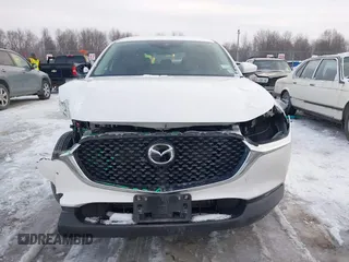 2021 Mazda CX-30 S with VIN 3MVDMBAL9MM221639, listed as a IAAI auction lot 41545920 with 57,239 mi miles and . Bid and sale history available at carsss.com. Image 13.