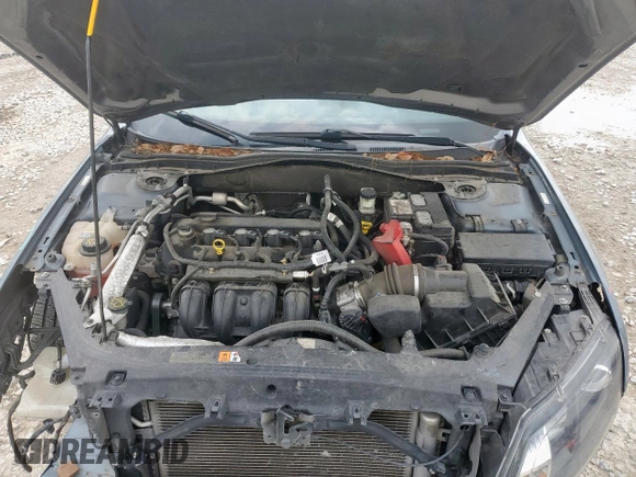2012 Ford Fusion SE z VIN 3FAHP0HA7CR234996, wystawiony jako Copart lot #59365175 z przebiegiem 117 769 mil mil oraz Szkoda całkowita • Salvage title. Historia ofert i sprzedaży dostępna na DreamBid. Obrazek 11.