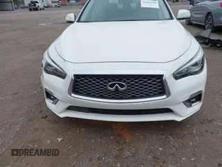 2019 Infiniti Q50 Luxe with VIN JN1EV7AP9KM513046, listed as a IAAI auction lot 41904330 with 51,608 mi miles and . Bid and sale history available at DreamBid. Image 12.