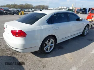 2015 Volkswagen Passat 2.0L TDI SEL Premium with VIN 1VWCV7A32FC057871, listed as a IAAI auction lot 41833501 with 151,754 mi miles. Bid and sale history available at carsss.com. Image 4.