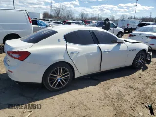 2014 Maserati Ghibli S Q4 z VIN ZAM57RTA2E1083387, wystawiony jako Copart lot #53621465 z przebiegiem Nie podano mil oraz Szkody całkowita. Historia ofert i sprzedaży dostępna na DreamBid. Obrazek 3.