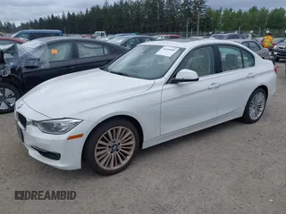 2012 BMW 3 Series 328i with VIN WBA3A5C56CF340427, listed as a IAAI auction lot 42246689 with 149,419 mi miles and . Bid and sale history available at DreamBid. Image 2.