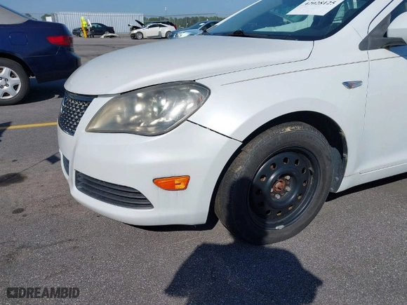 2012 Suzuki Kizashi S with VIN JS2RF9A12C6100223, listed as a IAAI auction lot 42028125 with 114,280 mi miles. Bid and sale history available at carsss.com. Image 6.