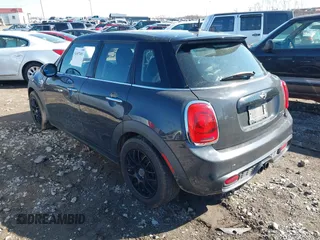 2015 MINI Hardtop 4 Door S with VIN WMWXU3C52F2B56517, listed as a IAAI auction lot 41437491 with 111,916 mi miles and . Bid and sale history available at DreamBid. Image 3.