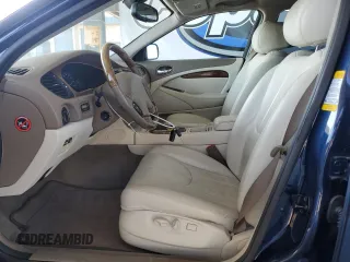 2002 Jaguar S-Type V6 z VIN SAJDA01N92FM22309, wystawiony jako Copart lot #56733435 z przebiegiem 33 224 mil mil oraz Tytuł czysty. Historia ofert i sprzedaży dostępna na DreamBid. Obrazek 7.