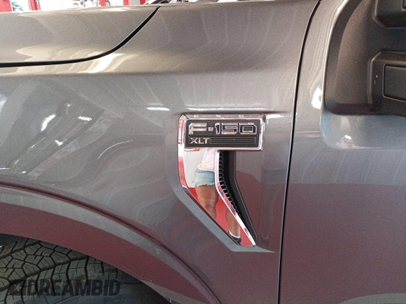 2021 Ford F-150 XL with VIN 1FTFW1E81MKE96112, listed as a IAAI auction lot 42788387 with 101,494 mi miles and . Bid and sale history available at DreamBid. Image 26.