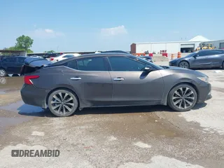 2016 Nissan Maxima SR z VIN 1N4AA6AP0GC400686, wystawiony jako IAAI lot #42378284 z przebiegiem 139 996 mil mil oraz . Historia ofert i sprzedaży dostępna na DreamBid. Obrazek 13.
