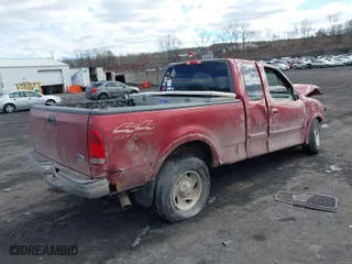 2000 Ford F-150 XL with VIN 1FTRX18W8YNB08110, listed as a IAAI auction lot 41701007 with 92,783 mi miles. Bid and sale history available at carsss.com. Image 4.