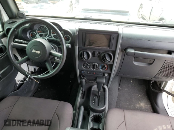 2009 Jeep Wrangler Rubicon with VIN 1J4GA64149L707142, listed as a Copart auction lot 76387344 with Not Provided miles and Salvage Title. Bid and sale history available at DreamBid. Image 8.