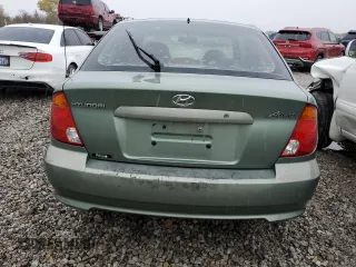 2003 Hyundai Accent GL with VIN KMHCG35C23U264701, listed as a Copart auction lot 80029154 with 142,090 mi miles and Salvage Title. Bid and sale history available at carsss.com. Image 6.