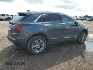 2021 Cadillac XT5 FWD Premium Luxury with VIN 1GYKNCRSXMZ118083, listed as a Copart auction lot 54703225 with 45,973 mi miles and Salvage Title. Bid and sale history available at carsss.com. Image 3.