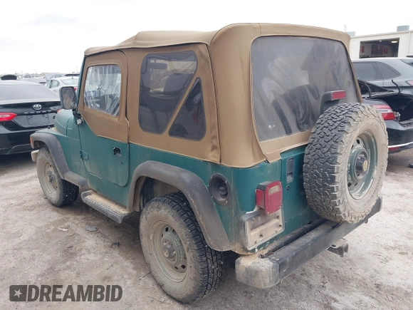 1997 Jeep Wrangler SE with VIN 1J4FY29P1VP408966, listed as a IAAI auction lot 41683640 with 106,910 mi miles. Bid and sale history available at carsss.com. Image 3.