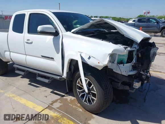 2023 Toyota Tacoma SR z VIN 3TYRZ5CN5PT034397, wystawiony jako IAAI lot #42055222 z przebiegiem 39 144 mil mil oraz . Historia ofert i sprzedaży dostępna na DreamBid. Obrazek 19.