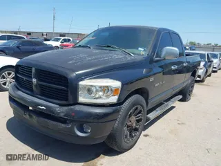 2007 Dodge Ram 1500 SLT with VIN 1D7HA18267S157810, listed as a IAAI auction lot 42005084 with 215,177 mi miles. Bid and sale history available at carsss.com. Image 2.