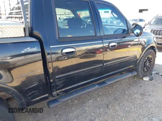 2003 Ford F-150 XLT with VIN 1FTRW07L43KB05221, listed as a IAAI auction lot 41762332 with 226,660 mi miles. Bid and sale history available at carsss.com. Image 6.