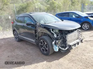 2017 Honda CR-V Touring with VIN 5J6RW2H96HL037854, listed as a IAAI auction lot 40472748 with 126,582 mi miles. Bid and sale history available at carsss.com. Image 1.