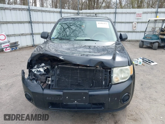 2009 Ford Escape XLS z VIN 1FMCU02759KA61417, wystawiony jako IAAI lot #42102452 z przebiegiem 207 262 mil mil oraz . Historia ofert i sprzedaży dostępna na DreamBid. Obrazek 12.