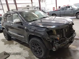2011 Jeep Grand Cherokee Overland Summit with VIN 1J4RR6GT5BC686743, listed as a IAAI auction lot 42565372 with 81,269 mi miles and . Bid and sale history available at DreamBid. Image 1.