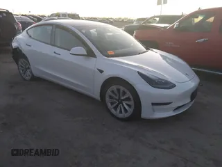 2021 Tesla Model 3 Standard Range Plus z VIN 5YJ3E1EA3MF043860, wystawiony jako IAAI lot #41214748 z przebiegiem 32 753 mil mil oraz . Historia ofert i sprzedaży dostępna na DreamBid. Obrazek 1.