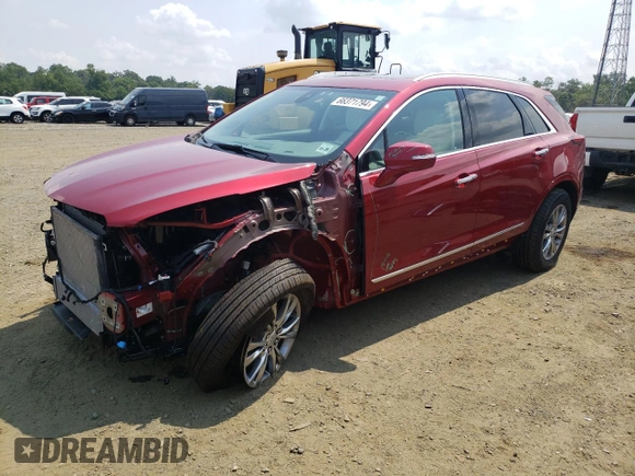 2023 Cadillac XT5 FWD Premium Luxury with VIN 1GYKNCR44PZ169259, listed as a Copart auction lot 66371794 with 13,319 mi miles and Salvage Title. Bid and sale history available at carsss.com. Image 1.