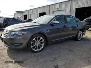 2015 Ford Taurus Limited with VIN 1FAHP2F84FG194934, listed as a Copart auction lot 62266315 with 107,824 mi miles and Salvage title. Bid and sale history available at DreamBid. Image 1.