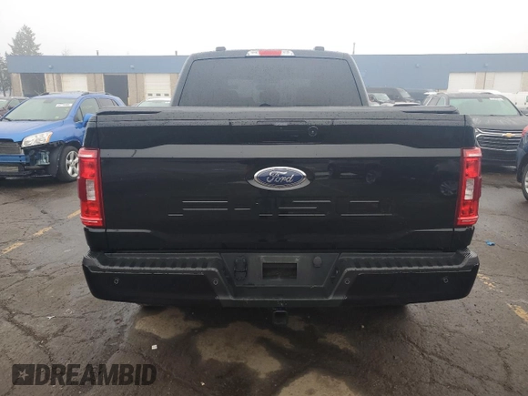 2023 Ford F-150 XL with VIN 1FTFW1ED2PFD30384, listed as a Copart auction lot 55593215 with 21,107 mi miles and Clean title. Bid and sale history available at DreamBid. Image 6.