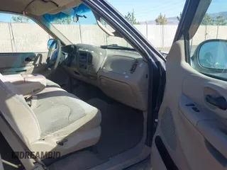 1999 Ford F-150 XL with VIN 1FTRX17L5XKB39130, listed as a IAAI auction lot 42041520 with Not Provided miles. Bid and sale history available at carsss.com. Image 5.