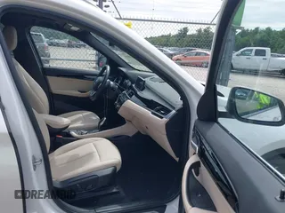 2021 BMW X1 xDrive28i with VIN WBXJG9C07M5U21337, listed as a IAAI auction lot 42590859 with 35,934 mi miles and . Bid and sale history available at DreamBid. Image 5.