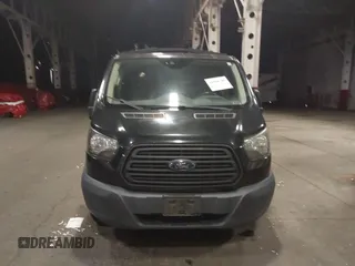 2015 Ford Transit Cargo with VIN 1FTYE1YM3FKA21679, listed as a IAAI auction lot 41900709 with 179,757 mi miles. Bid and sale history available at carsss.com. Image 12.