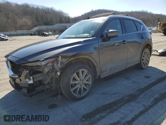 2018 Mazda CX-5 Grand Touring with VIN JM3KFBDM2J0407164, listed as a Copart auction lot 50080345 with 126,464 mi miles and Salvage title. Bid and sale history available at DreamBid. Image 1.
