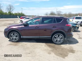 2016 Toyota RAV4 LE with VIN 2T3ZFREV8GW310580, listed as a IAAI auction lot 42063071 with 104,099 mi miles and . Bid and sale history available at DreamBid. Image 15.