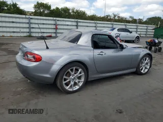 2015 Mazda MX-5 Miata Grand Touring z VIN JM1NC2PF0F0238698, wystawiony jako Copart lot #55455395 z przebiegiem Nie podano mil oraz Szkody całkowita. Historia ofert i sprzedaży dostępna na DreamBid. Obrazek 3.