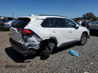 2023 Toyota RAV4 XLE with VIN 2T3W1RFVXPC216198, listed as a Copart auction lot 49070535 with 19,666 mi miles and Salvage Title. Bid and sale history available at carsss.com. Image 3.