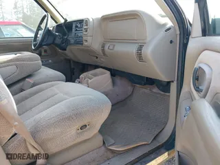 1998 Chevrolet Tahoe with VIN 1GNEK13R9WJ365044, listed as a IAAI auction lot 42042506 with 187,987 mi miles. Bid and sale history available at carsss.com. Image 5.