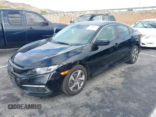 2020 Honda Civic Sedan LX with VIN 2HGFC2F69LH530736, listed as a IAAI auction lot 41765663 with 138,576 mi miles. Bid and sale history available at carsss.com. Image 2.