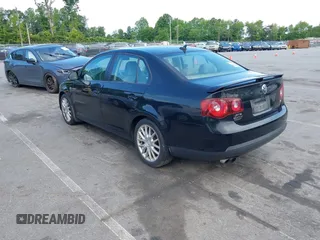 2009 Volkswagen Jetta Wolfsburg Edition with VIN 3VWRJ71K29M042593, listed as a IAAI auction lot 42194886 with 174,183 mi miles and . Bid and sale history available at DreamBid. Image 3.