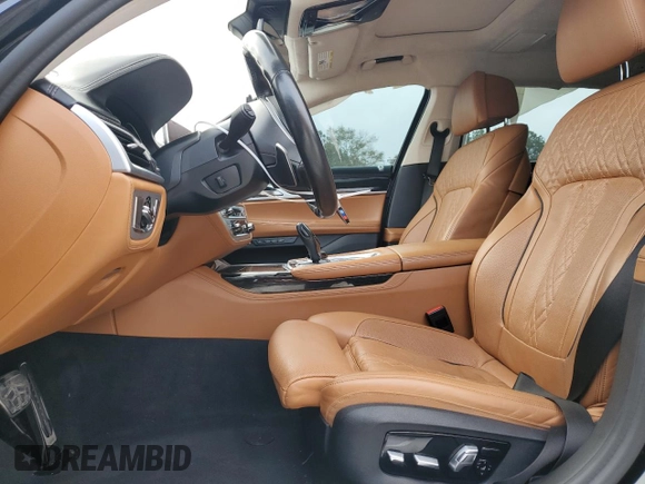 2019 BMW 7 Series M760i xDrive with VIN WBA7H6C51KG615276, listed as a Copart auction lot 79597234 with 39,195 mi miles and Salvage Title. Bid and sale history available at carsss.com. Image 7.