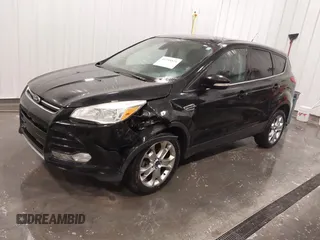 2013 Ford Escape SEL with VIN 1FMCU9H99DUD11347, listed as a IAAI auction lot 41758824 with 154,339 mi miles. Bid and sale history available at carsss.com. Image 2.