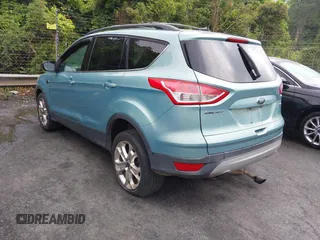 2013 Ford Escape SE with VIN 1FMCU9GX5DUD51120, listed as a IAAI auction lot 42196923 with 183,386 mi miles and . Bid and sale history available at DreamBid. Image 3.