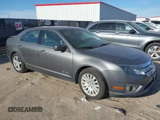 2010 Ford Fusion Hybrid with VIN 3FADP0L39AR344842, listed as a IAAI auction lot 41784141 with 128,956 mi miles. Bid and sale history available at carsss.com. Image 1.